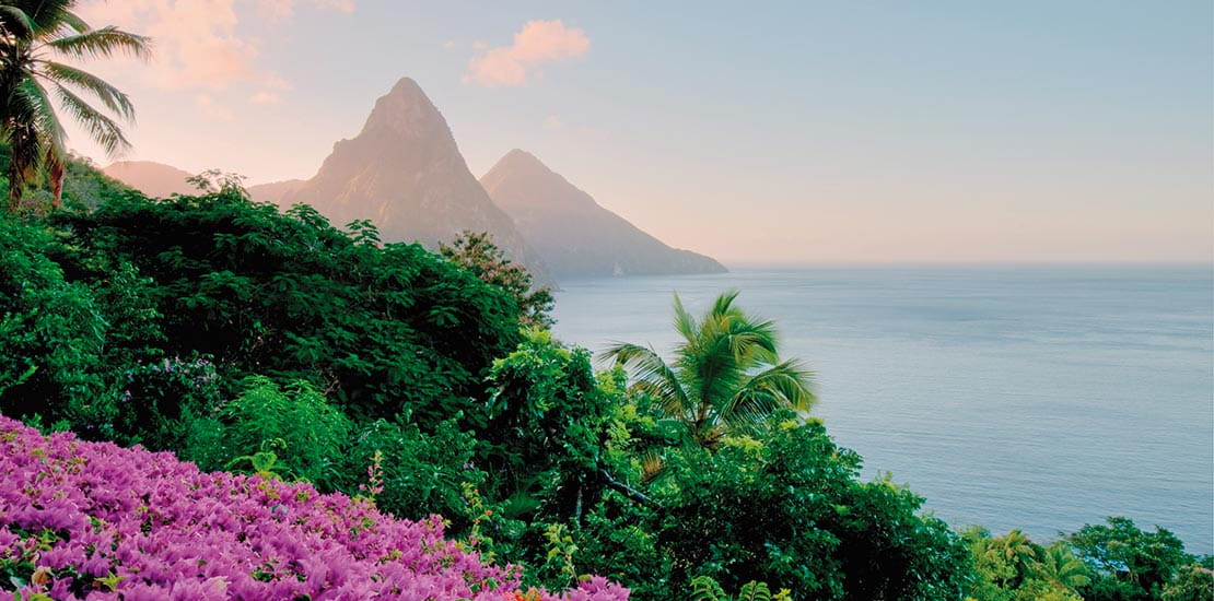 A view towards The Pitons in St Lucia at dusk